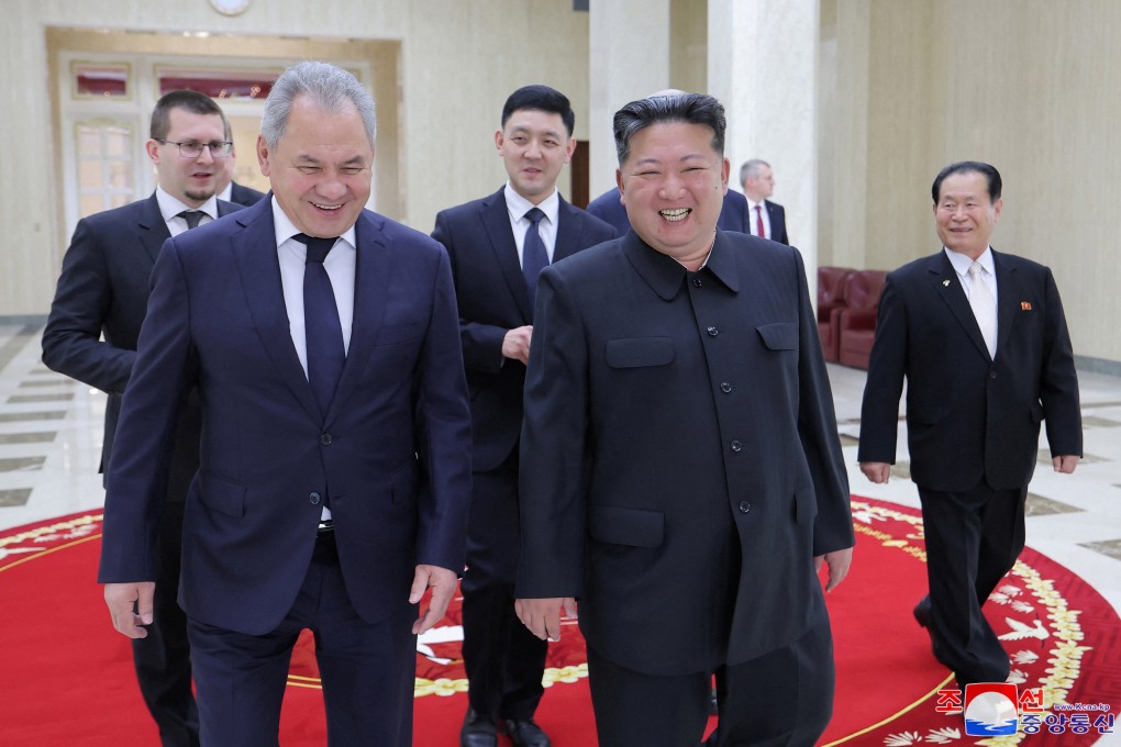 Russia’s top security adviser Sergei Shoigu (left) and North Korean leader Kim Jong-un during Shoigu’s visit to North Korea on March 22. Photo:   KCNA via Reuters