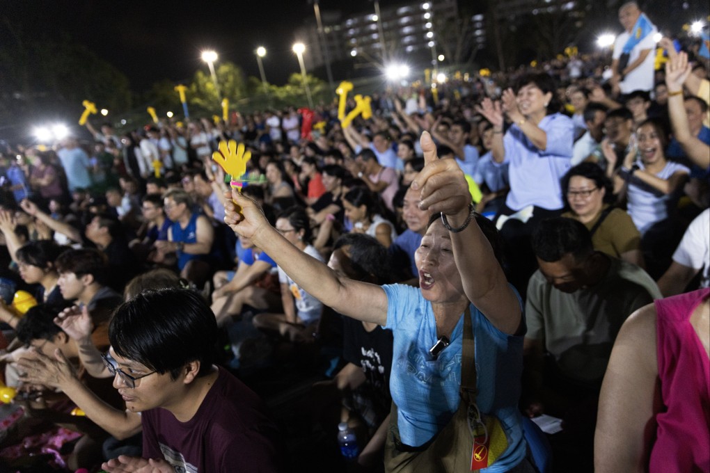 People attend an election rally in Singapore on April 26. Photo: EPA-EFE