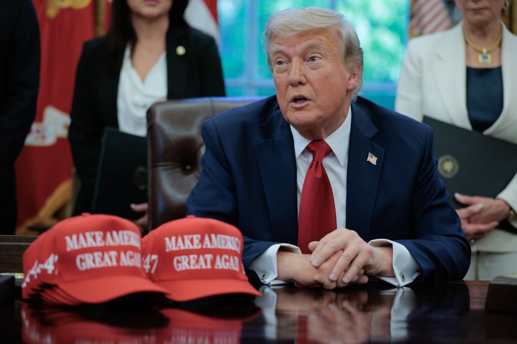 US President Donald Trump in the Oval Office at the White House in Washington. Photo: Getty Images / TNS