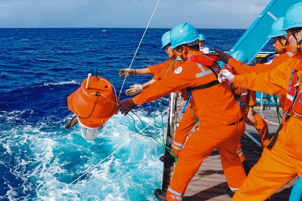 A team on the research vessel Shen Kuo arrives at a deep-sea station in the western Pacific in 2018. The undersea network is also expected to provide support for scientific observation. Photo: Xinhua
