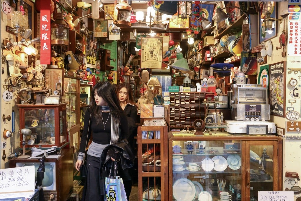 Customers browse in an antique shop in Sheung Wan on January 19. Businesses with price-sensitive customers may need to pivot and provide other goods or services. Photo: Dickson Lee