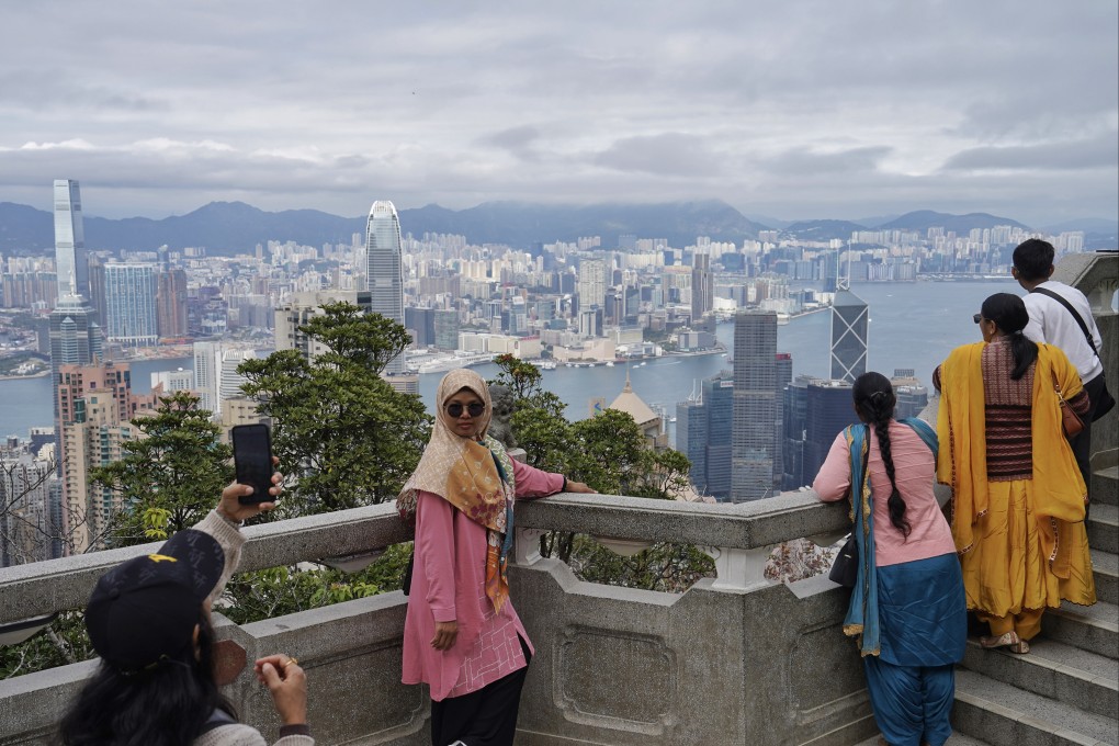 Tourists visit The Peak on February 1. Photo: Elson Li