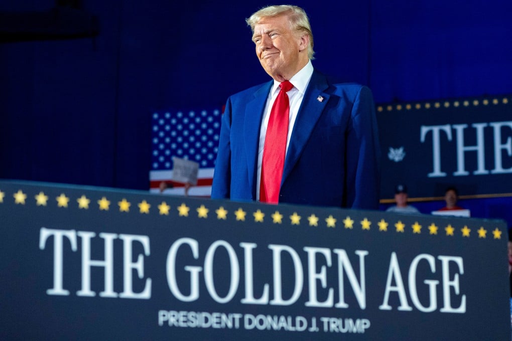 President Donald Trump arrives to speak on his first 100 days at a Macomb County sports centre in Warren, Michigan, on Tuesday. Photo: AP