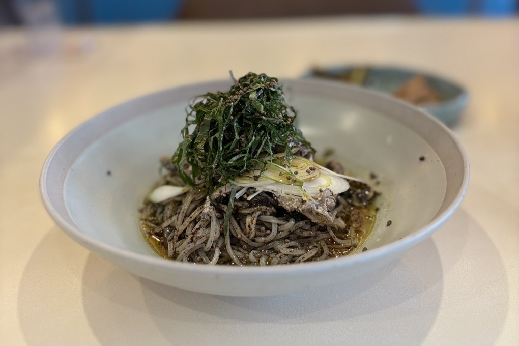 A perilla oil noodle dish topped with shredded perilla (shiso leaf) and perilla seeds at Nanpo Hannam, in Seoul. Perilla oil is “Korea’s olive oil”. Photo: Charmaine Mok