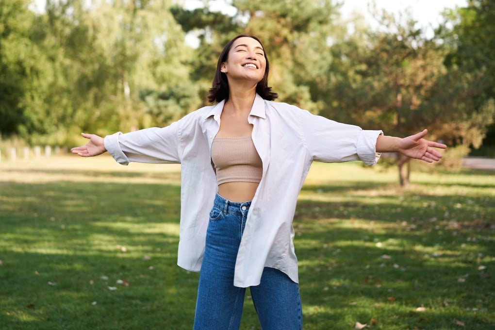 A woman finds joy outside in nature. Many people “forgot” how to experience joy during the Covid-19 pandemic, according to Dr MaryCatherine McDonald. She gives tips on how to reawaken the feeling within you. Photo: Shutterstock