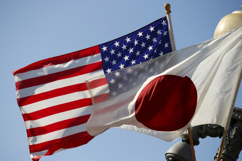 The US and Japan flags fly outside the White House. A poll reveals 77 per cent of Japanese citizens doubt US commitment to defending them in a crisis. Photo: Reuters