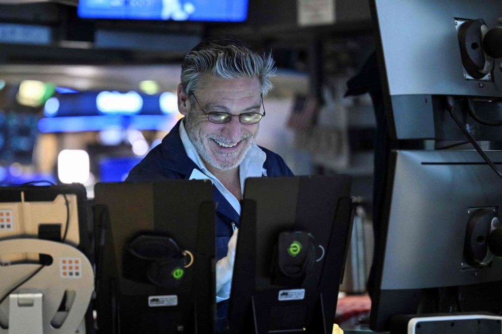 A trader works on the New York Stock Exchange floor on April 9, as stocks surge amid news of delayed tariffs. Photo: AFP