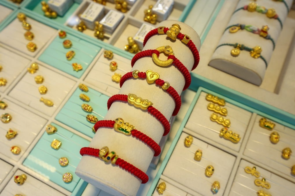 Gold jewellery on display at a store in Beijing on March 31. Photo: EPA-EFE