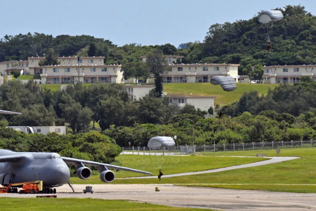 US troops conduct a parachuting drill at an airbase in Japan’s Okinawa last year. Photo: Kyodo
