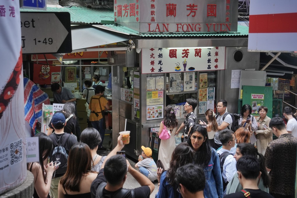 Tourists queue up to dine at a restaurant in Central. Photo: Elson Li