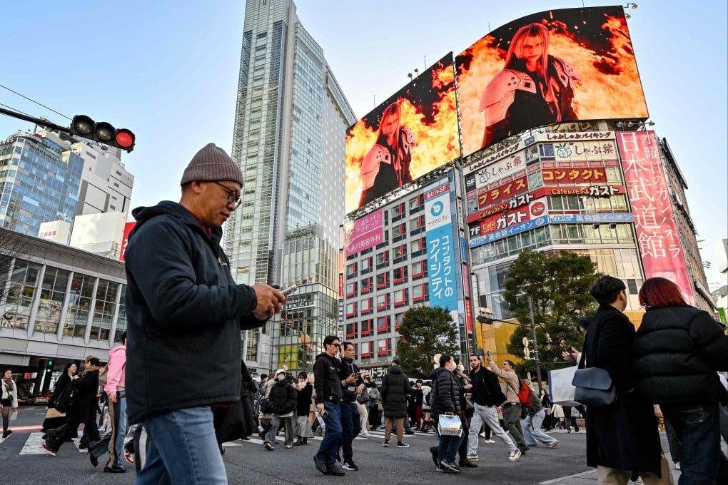 Pedestrians cross a street in the Shibuya district of Tokyo on February 27, 2024. Photo: AFP