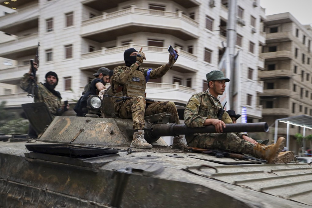 Members of Syria’s security forces deploy in the town of Sahnaya, south of Damascus, on Wednesday. Photo: AFP