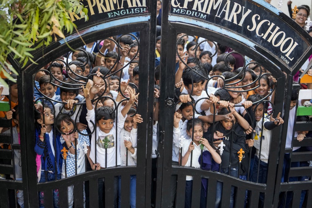 Free lunches are offered to millions of children in government schools throughout India, seen by authorities as a way to encourage children to continue their education. Photo: AP