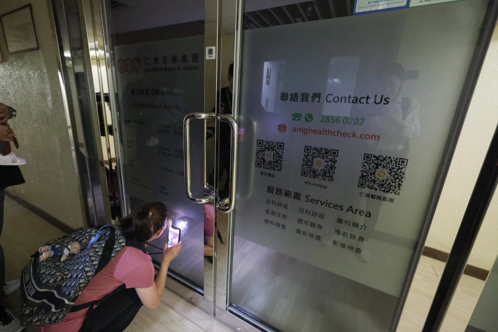 A woman checks on the operations of an Alliance Medical Group clinic in Tsim Sha Tsui. Photo: Nora Tam