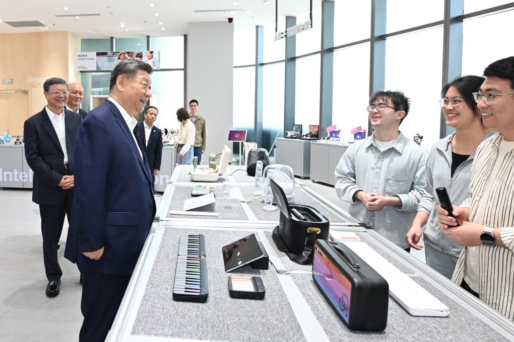 Chinese President Xi Jinping visits an AI product experience store at the Shanghai Foundation Model Innovation Center, a large-model incubator home to over 100 enterprises, in Shanghai on Tuesday. Photo: Xinhua