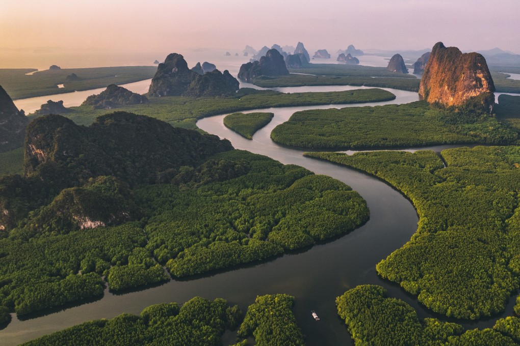 Soaking up sights of Phang Nga Bay, Thailand, from sky, sea and land. Photo: Shutterstock