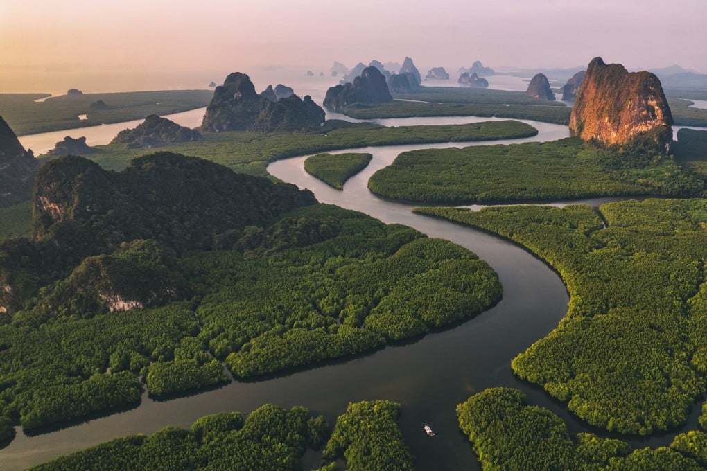 Soaking up sights of Phang Nga Bay, Thailand, from sky, sea and land. Photo: Shutterstock