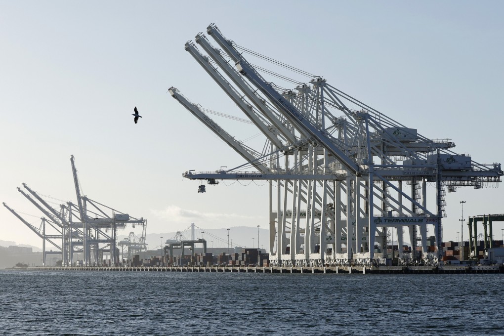 Container cranes and empty berths along the Port of Oakland in California. Photo: EPA-EFE