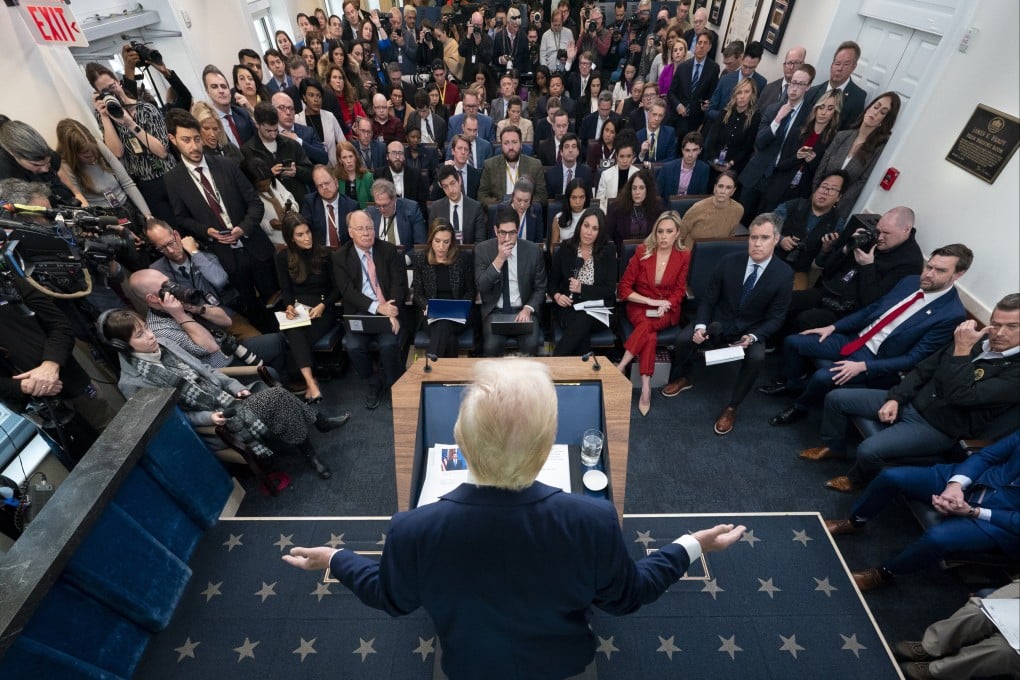 President Donald Trump speaks with reporters at the White House on January 30. File photo: AP