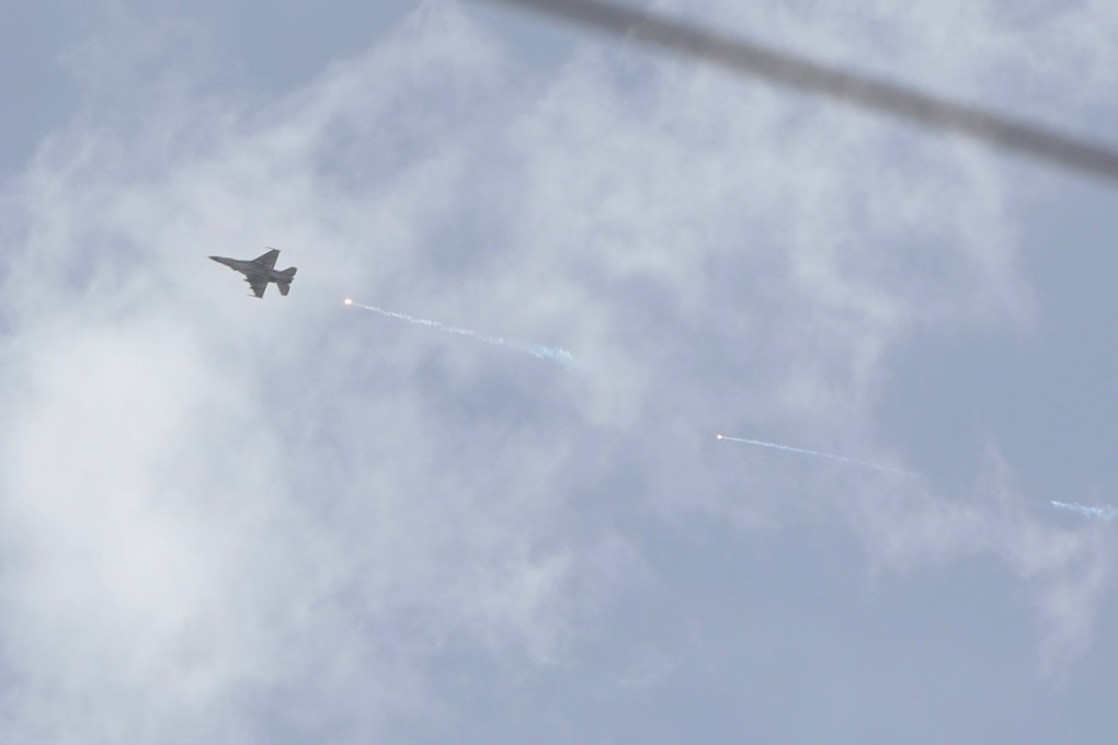 An Israeli fighter jet flies over an area near the Syrian capital Damascus on Wednesday. Photo: AFP