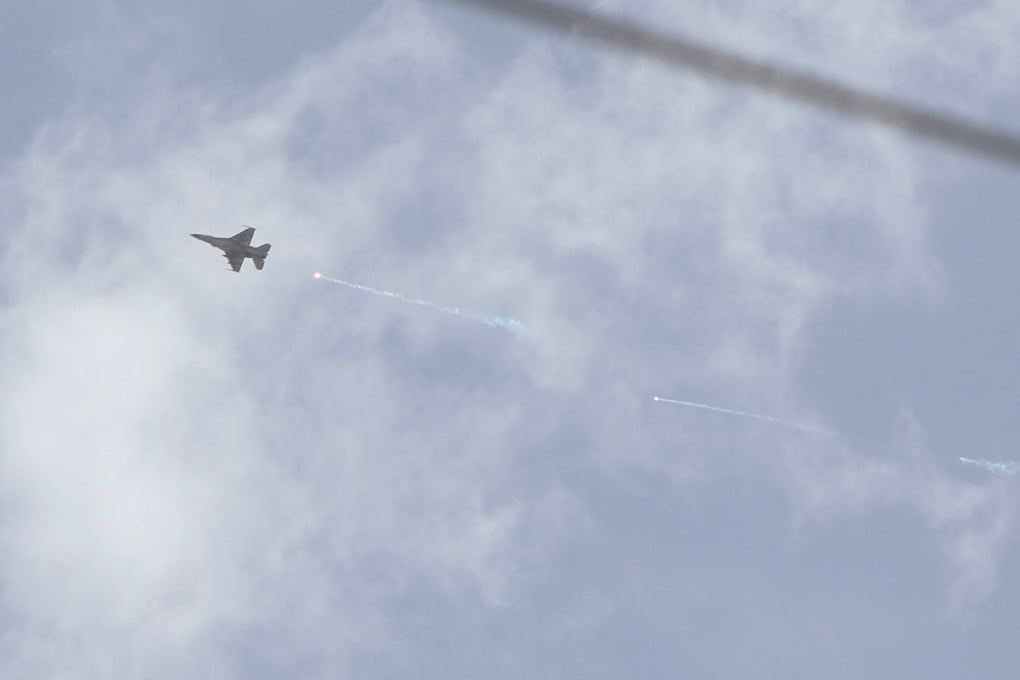 An Israeli fighter jet flies over an area near the Syrian capital Damascus on Wednesday. Photo: AFP