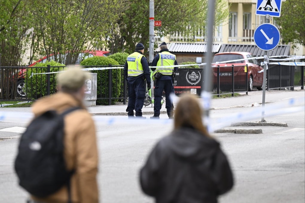 Police at the scene on Wednesday, a day after after a shooting at Vaksala Square in central Uppsala, Sweden. Photo: EPA-EFE