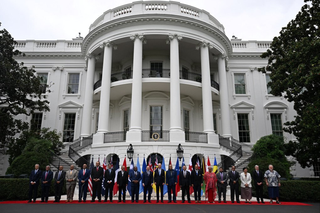 Former US president Joe Biden (centre) stands with Pacific Islands Forum leaders at the White House following a summit in 2023. Photo: AFP