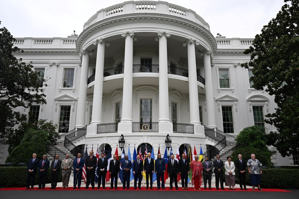 Former US president Joe Biden (centre) stands with Pacific Islands Forum leaders at the White House following a summit in 2023. Photo: AFP