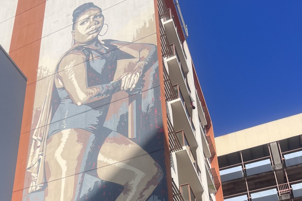 A mural of an indigenous Australian transgender woman adorns a building in Darwin, which hosts an annual street art festival in May and June. Photo: Kylie Knott