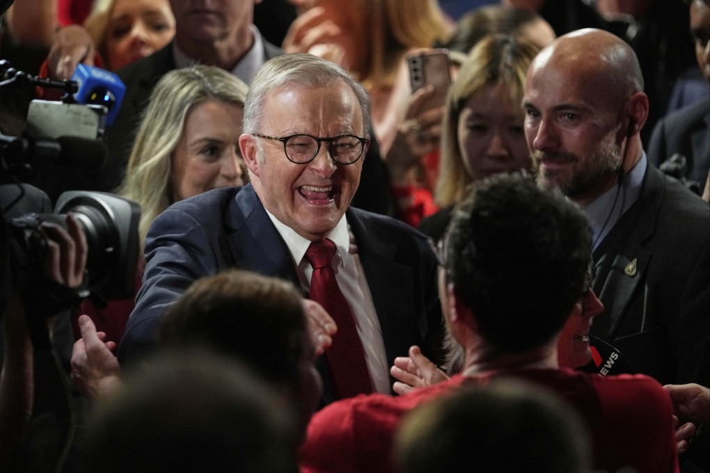 Australian Prime Minister Anthony Albanese reacts in Sydney on Saturday as he meets party faithful after winning a second term. Photo: AP