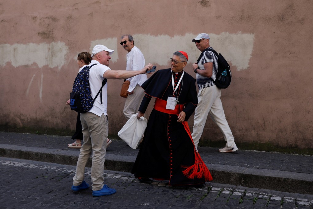 Cardinal Stephen Chow of Hong Kong greets people in Rome on May 3, 2025, as he heads to a general congregation meeting ahead of the conclave to elect the next pope. Photo: Reuters