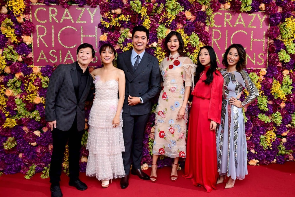 (From left) Ken Jeong, Constance Wu, Henry Golding, Gemma Chan, Awkwafina and Jing Lusi attend the Crazy Rich Asians premiere in London in 2018. Golding recently met Chan and Awkwafina to talk about a small-screen adaptation. Photo: Ian West/PA Wire/Abaca Press/TNS