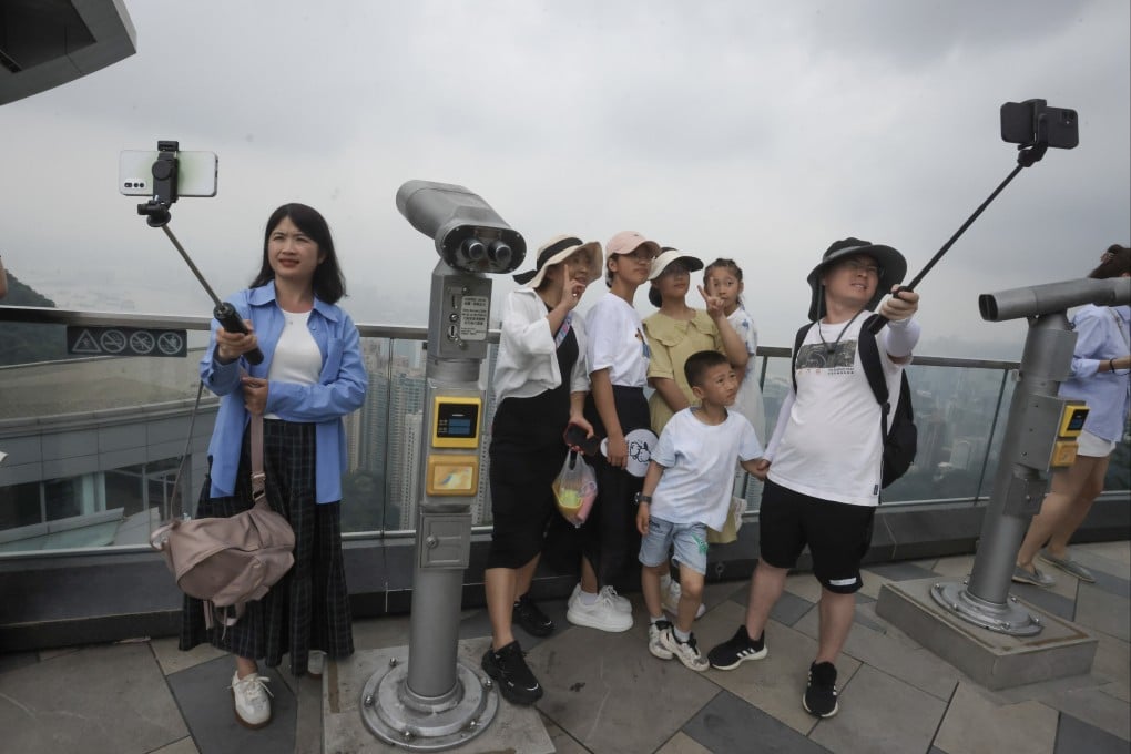 Tourists are flocking to popular spots such as the The Peak. Photo: Jonathan Wong
