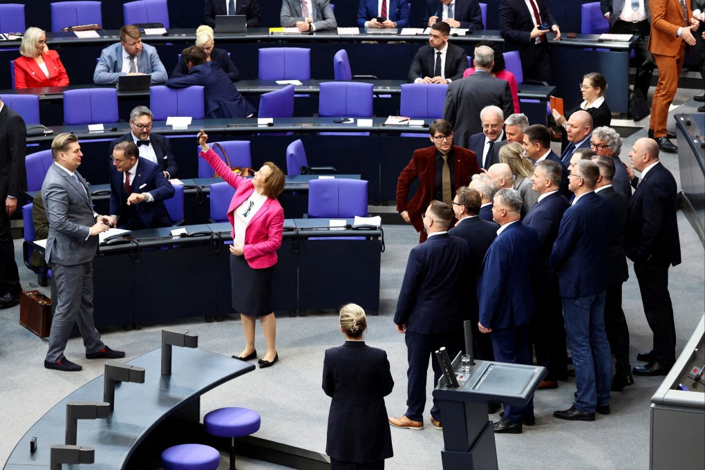 AfD members take a selfie before the inaugural meeting of Germany’s lower house of parliament in Berlin on March 25. Photo: Reuters