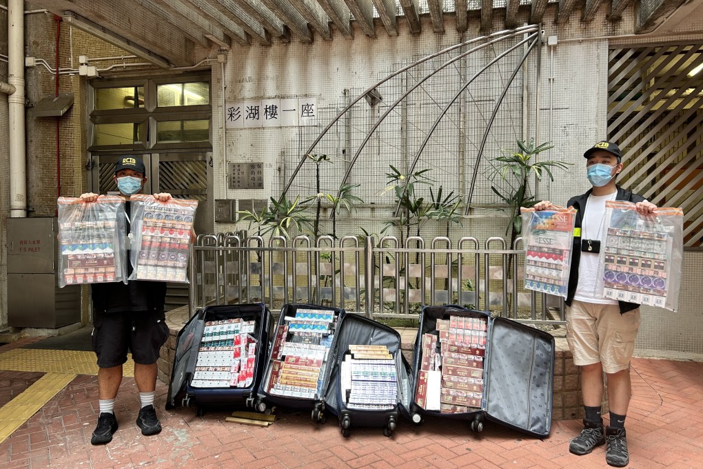 Customs officers display goods seized on Sunday after two helpers were intercepted in Sheung Shui. Photo: Handout