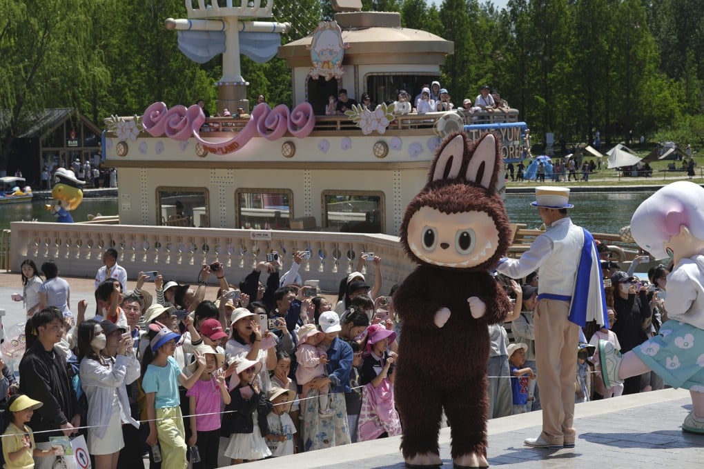 A costumed character performs in Pop Land, a theme park featuring IP like Labubu, in Beijing on May 1. Photo: AP
