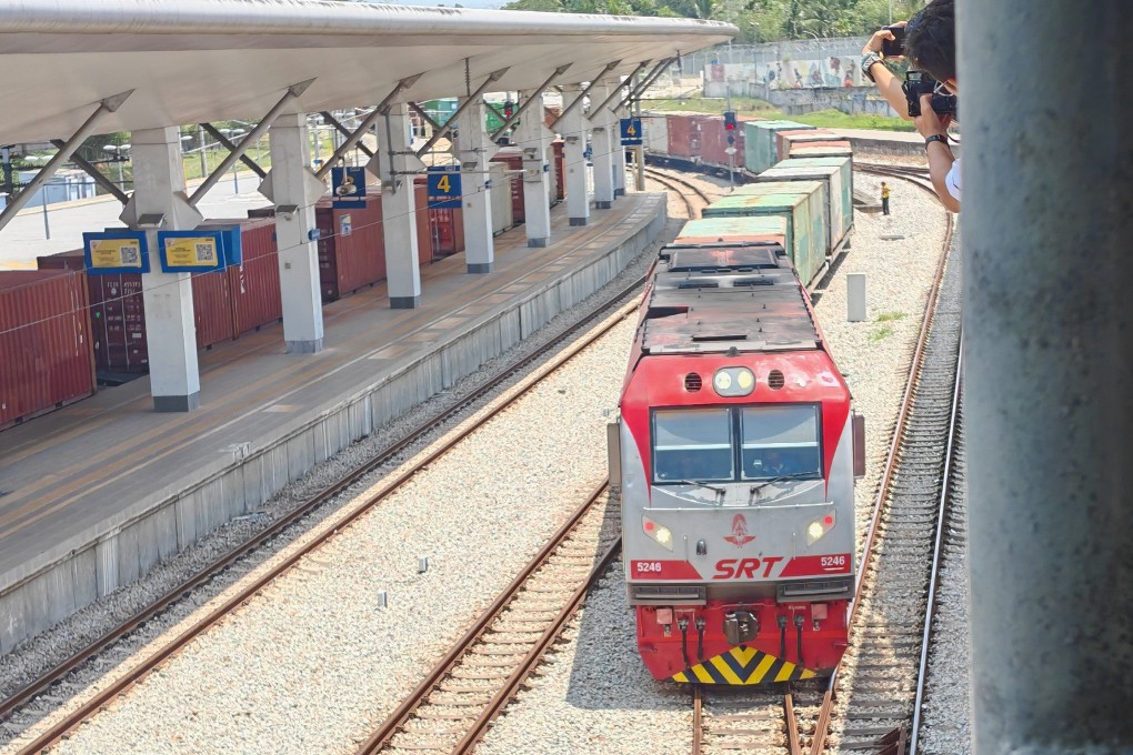 A goods train carrying cargo from Thailand arrives at a terminal in Malaysia’s Perlis state. A direct rail cargo service between Kuala Lumpur and Bangkok is planned to start this year. Photo: Joseph Sipalan