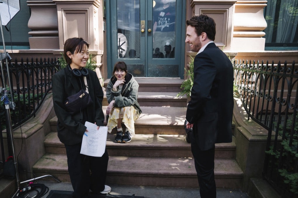Director Celine Song with stars Dakota Johnson and Chris Evans on the set of Materialists. The film about a matchmaker explores finding love on New York’s “stock market of men”. Photo: A24 via AP