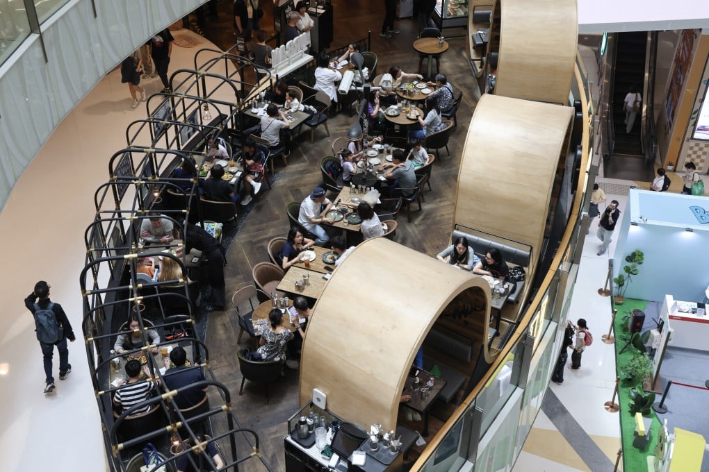 Diners at a restaurant in Mong Kok. According to data from the Food and Environmental Hygiene Department, 17,154 restaurant licences were valid as of the end of April, a drop of 255 from the same month last year. Photo: Jelly Tse