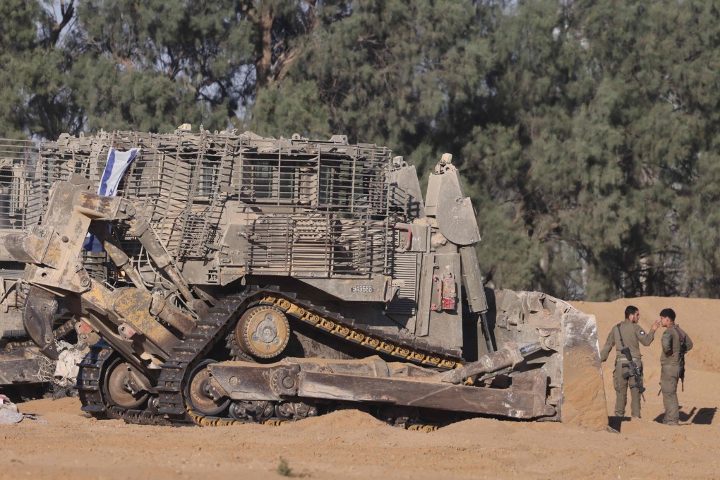 Israeli troops deploy at a position near Israel’s border with Gaza on Monday. Photo: AFP