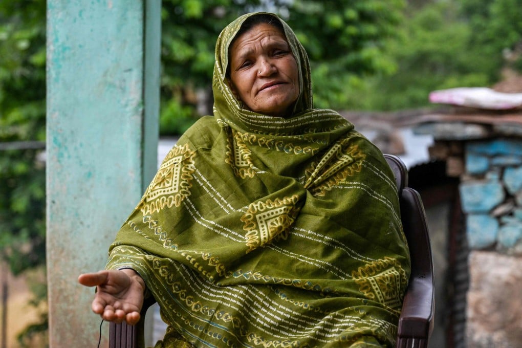 Nasreen Akhtar Bi and her eight siblings were detained by police and taken to the border with Pakistan. Photo: AFP