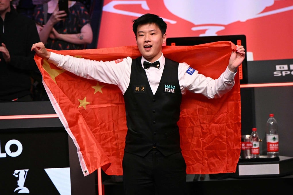 Zhao Xintong celebrates becoming China’s first winner of the World Snooker Championship. Photo: AFP