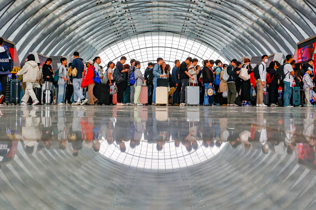 Passengers wait for trains at the Tianjin West Railway Station on Monday, the last day of the five-day Labour Day holiday period. China’s railway system transported more than 100 million passengers over the holiday. Photo: Xinhua