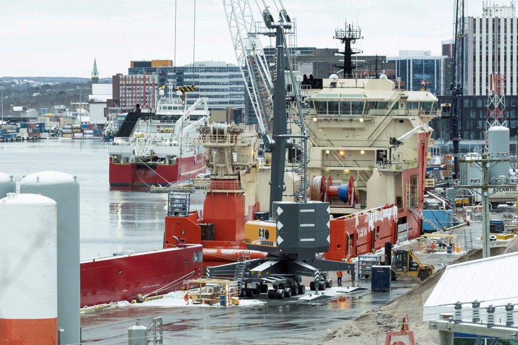 Supply ships that service offshore oil rigs on Canada’s east coast load cargo in St John’s, Newfoundland, in February. Photo: Reuters