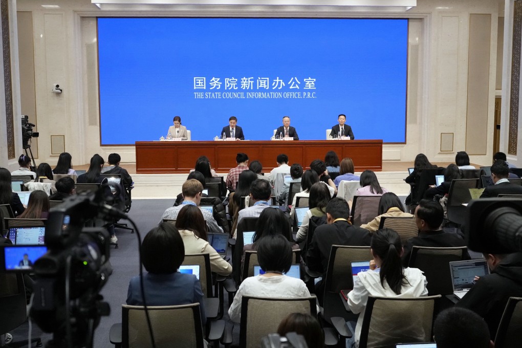 China’s top financial officials announce a series of measures to boost the economy and stabilise capital markets during a press conference in Beijing on Wednesday. Photo: Kyodo