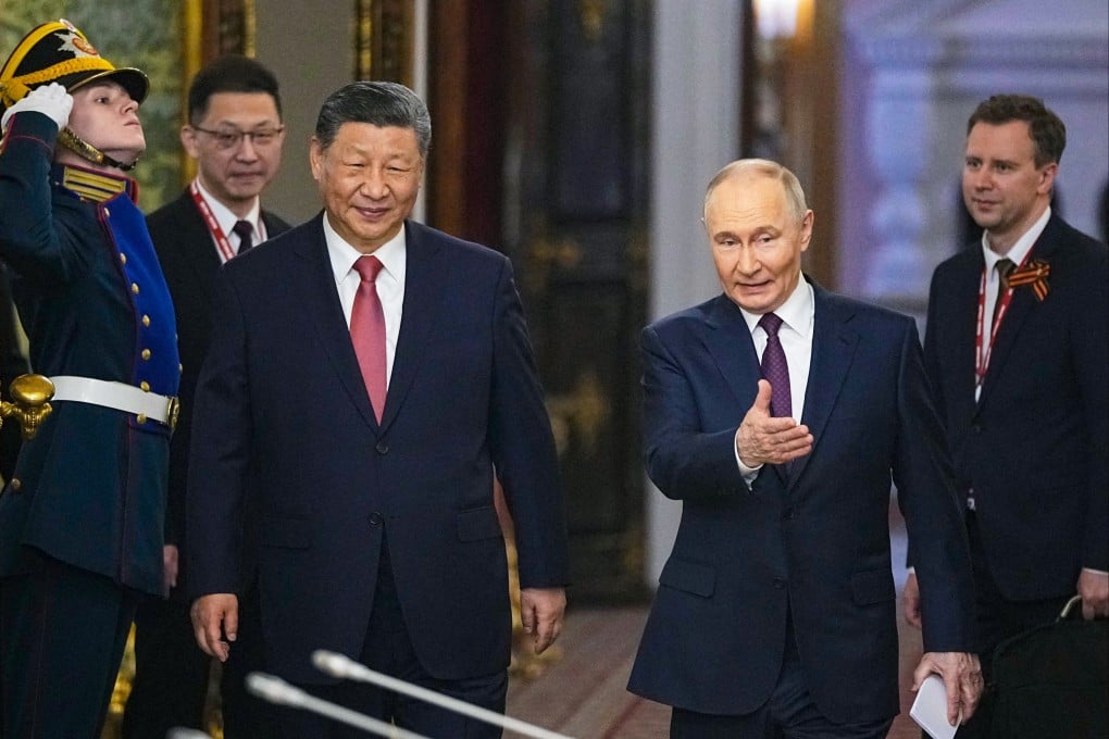 China’s President Xi Jinping and his Russian counterpart Vladimir Putin arrive for their talks at the Kremlin on Thursday. Photo: AFP