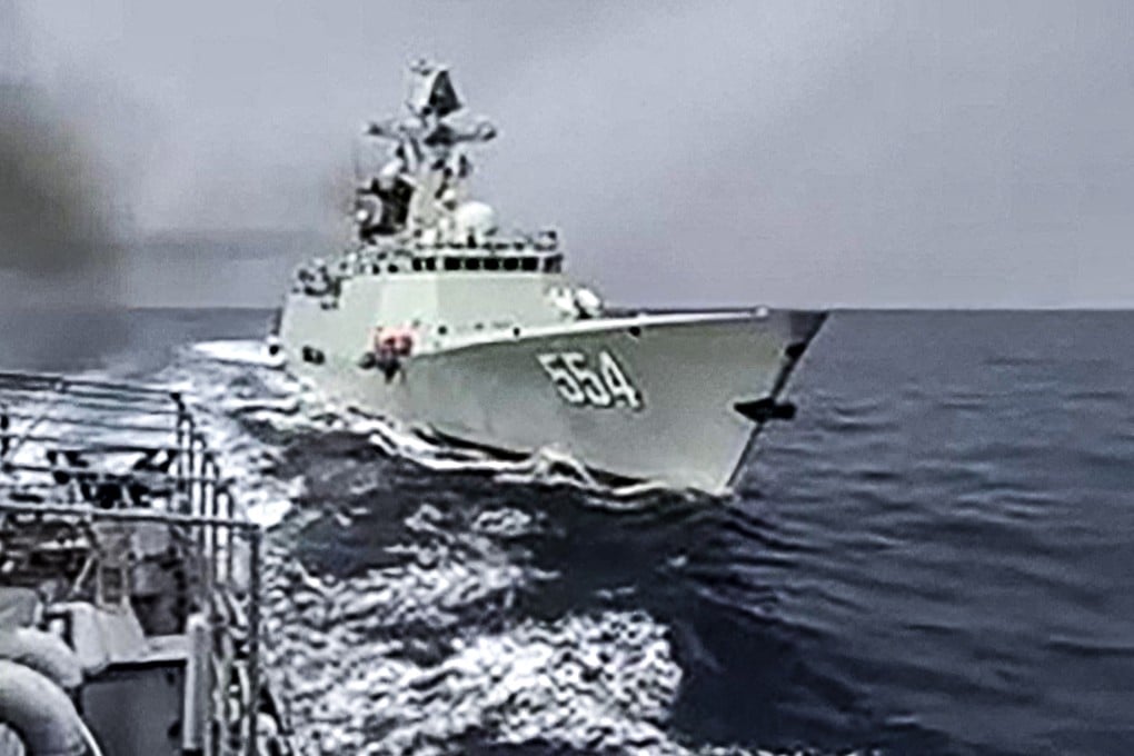 The Chinese frigate BN 554 tails the Philippine warship BRP Emilio Jacinto near Scarborough Shoal in the South China Sea on Monday in a rare incident involving the two navies. Photo: AFP/Armed Forces of the Philippines Public Affairs Office