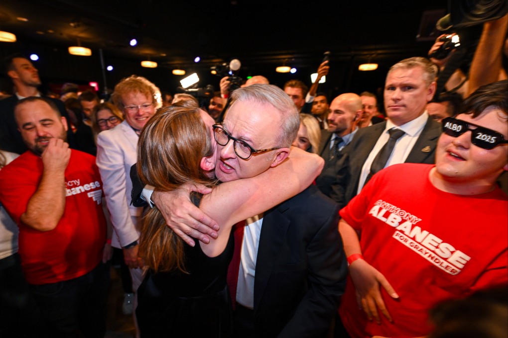 Australian Prime Minister Anthony Albanese receives a hug during on election day in Sydney on Saturday. Amid growing alarm about Donald Trump-style populism, recent election winners in Australia, Singapore and Canada have much to thank the US president for. Photo: EPA-EFE