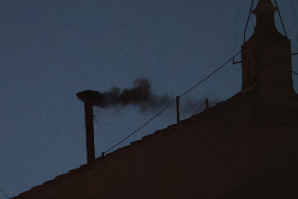 Black smoke rises from the chimney on the Sistine Chapel on Wednesday. Photo: Reuters