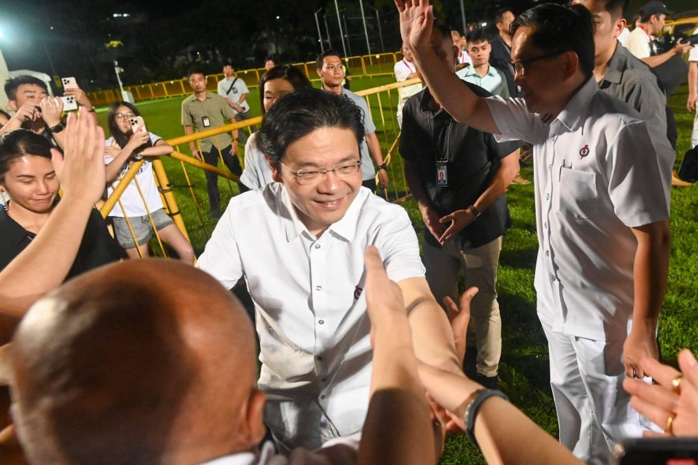 Prime Minister Lawrence Wong greets his supporters after the election in Singapore on May 3. Photo: AFP